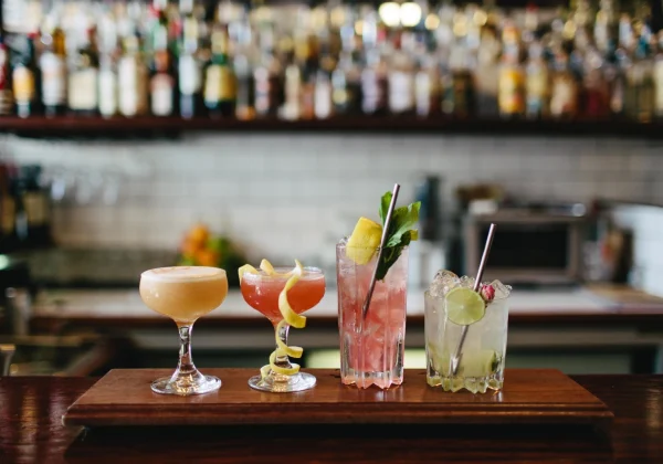 Four cocktails on a table