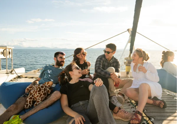 People chatting while on a sailing boat