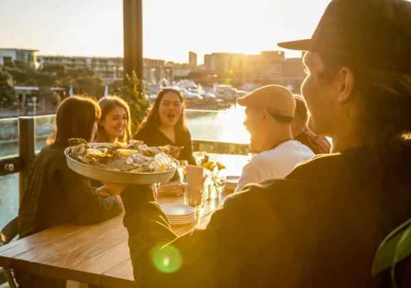 People eating at a restaurant sea side