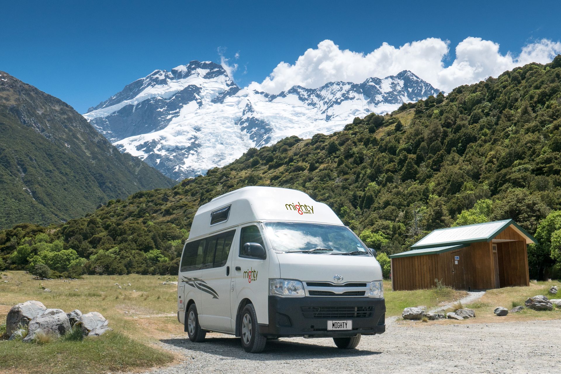 Campervan park in front of a mountain