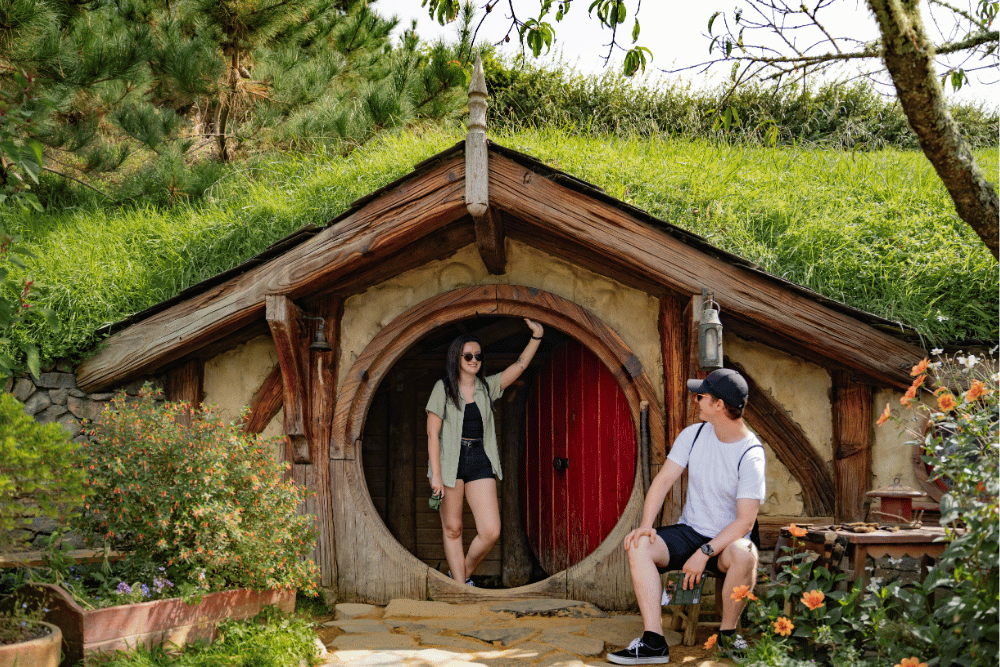 Person standing in a hobbits house in the Lord Of The Rings set