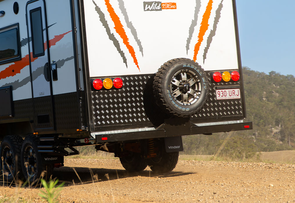 Close-up of a hot-dipped bumper, storage compartment, LED lights, and roof hatch, highlighting practical and durable features