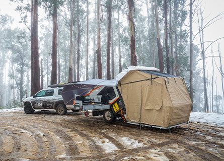 Camper trailer in the snow