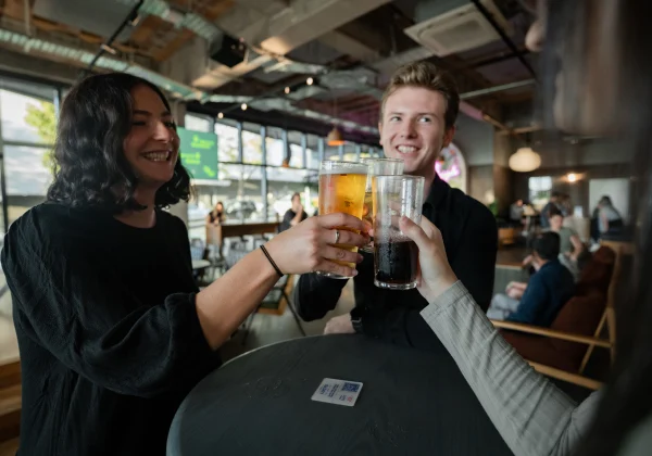 People enjoying a beer at a pub