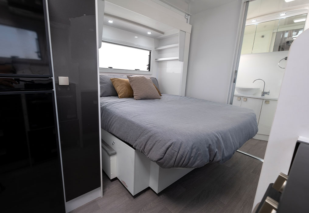 Winnebago Coogee 4 Berth Motorhome Interior Electric slide-out bed + cab bed