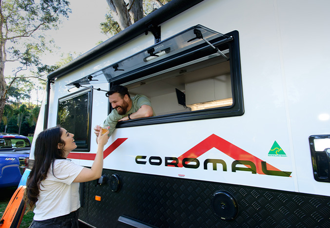 Couple in a Coromal Caravan
