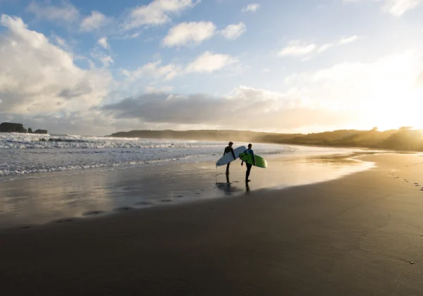 Surfers about to go surfing