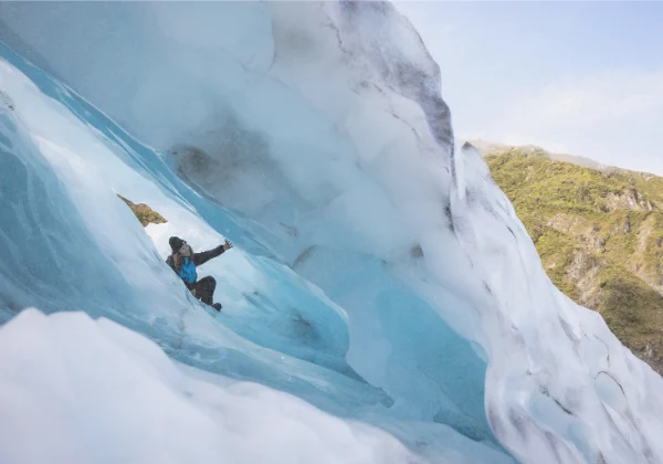 Person exploring an ice cave