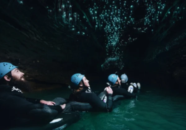 Black water rafting through a cave