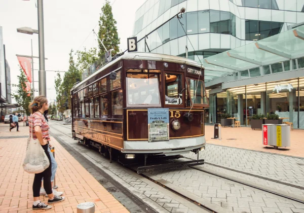 Vintage tram travelling through city streets