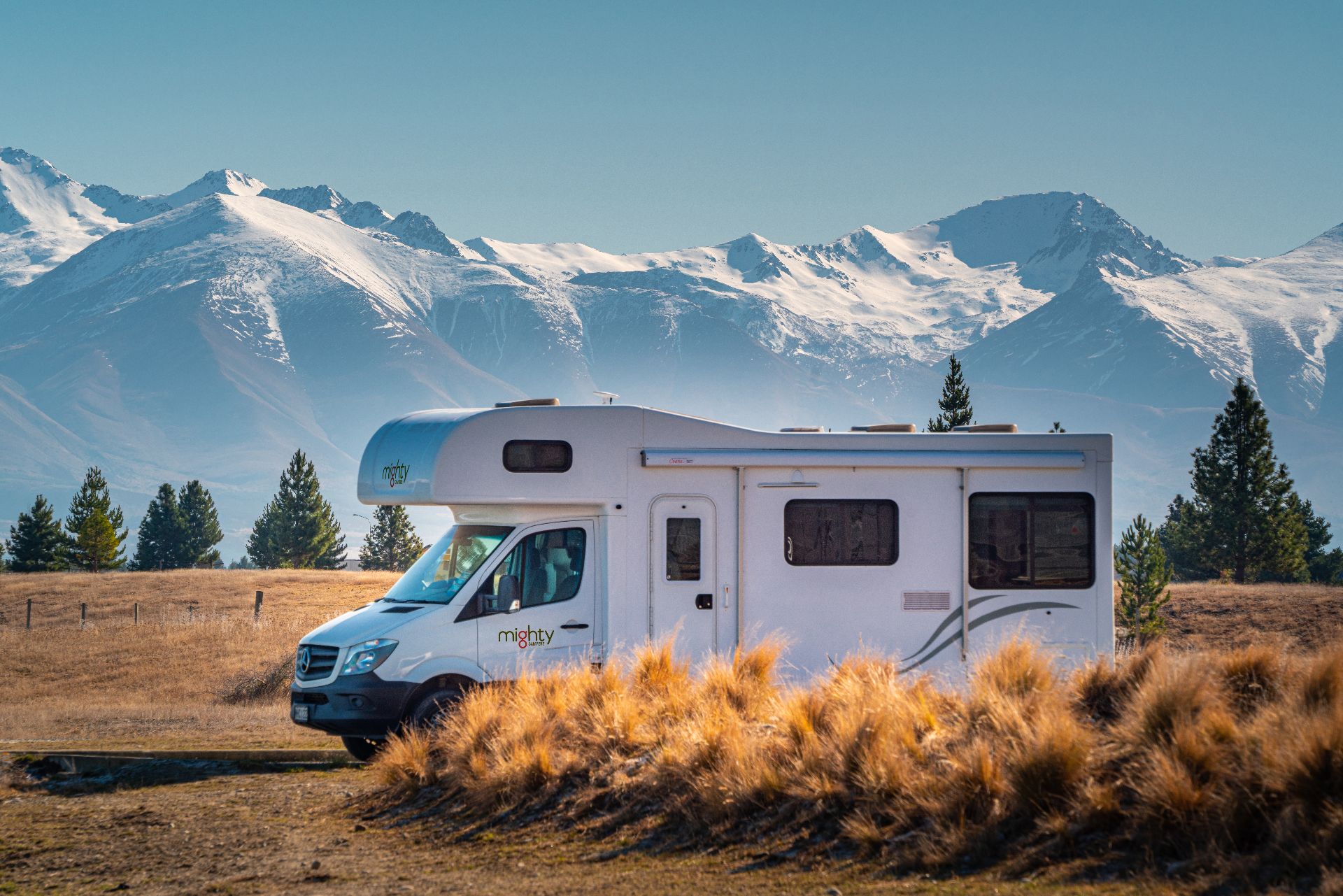 Campervan park in front of a mountain