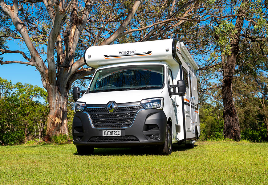 Front view of a motorhome, highlighting its exterior design and front-facing features.