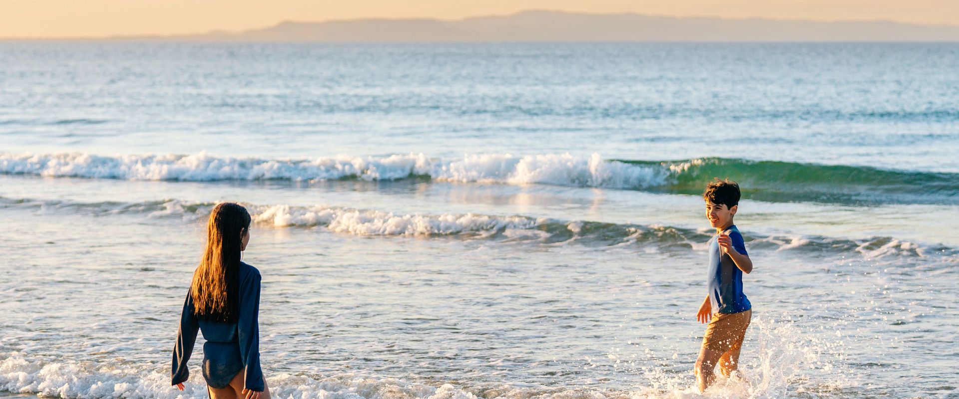 kids playing the surf