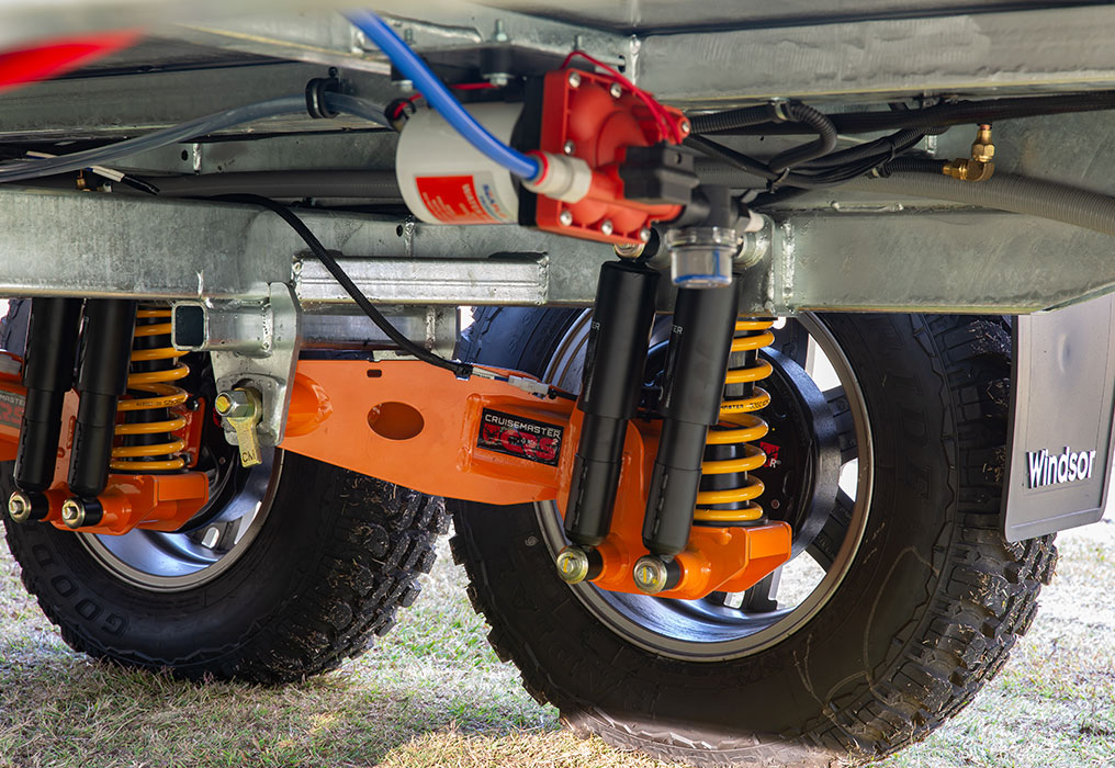 Detailed view of a Cruisemaster suspension and hot-dipped chassis, showcasing advanced engineering and robust construction